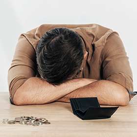 Man With Wallet and Coins