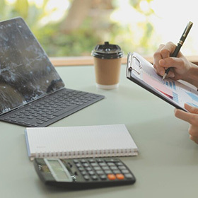 A Desk With Office Things On