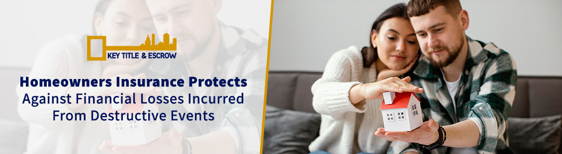 A Couple Holding a Carton House