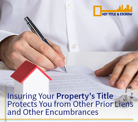 Let Key Title & Escrow Protect You From Prior Liens and Other Encumbrances With Our Title Insurance Services in Florida Picture of a Man Signing Title Insurance Papers After Purchasing a House in Miami, Florida